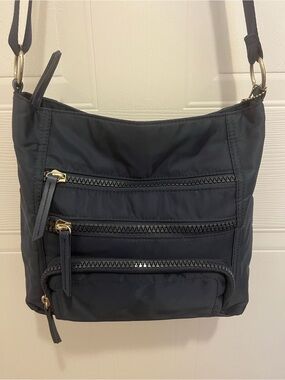 Denver Hayes Navy Blue Crossbody Travel Bag with Built-in Wallet.